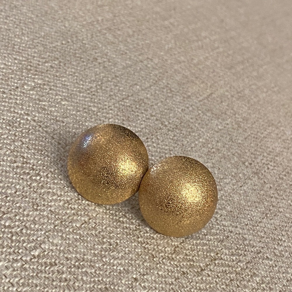 Oversized gold studs